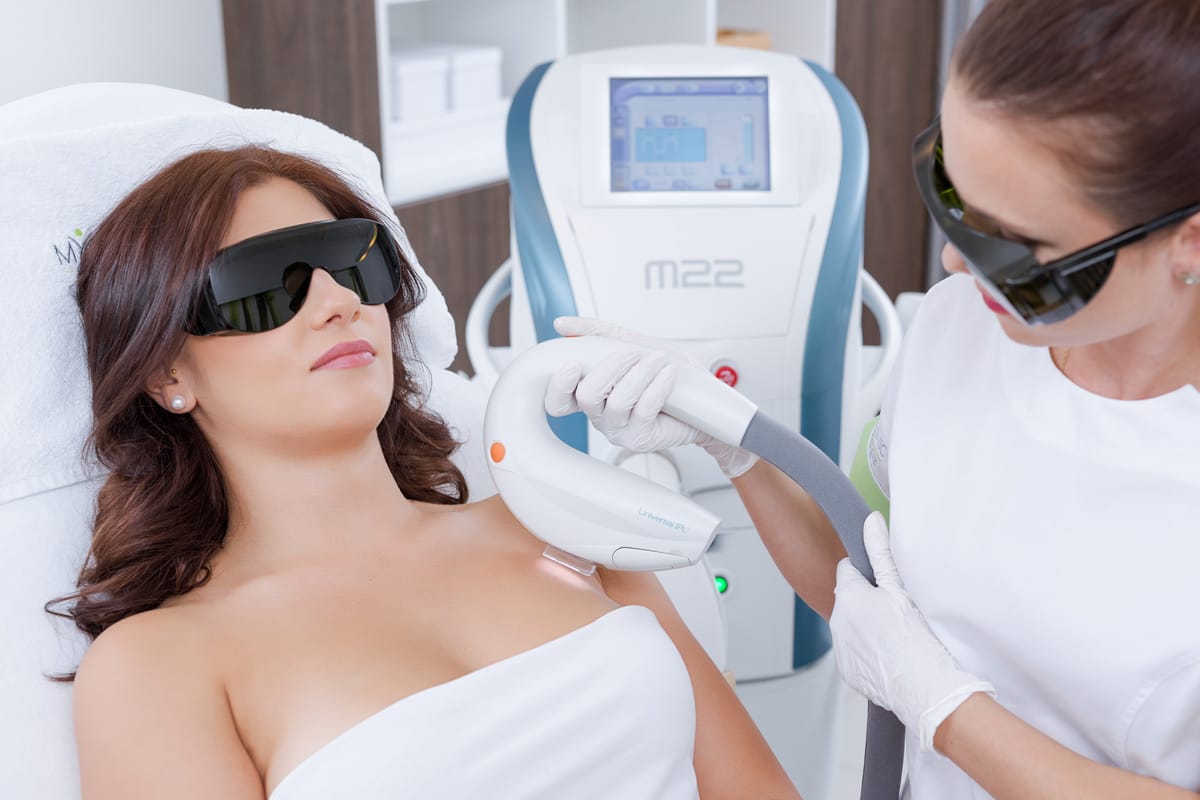 Young woman Getting IPL Treatment | Aesthetic Center of Richmond | Glen Allen, VA