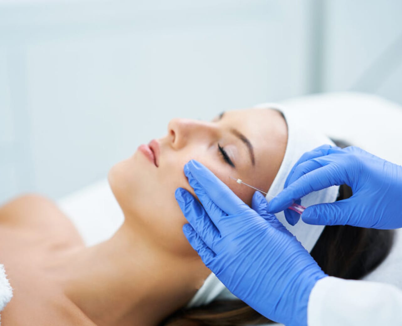 A Woman getting treatment by Injection | PDO threads | Aesthetic Center of Richmond in Glen Allen, VA
