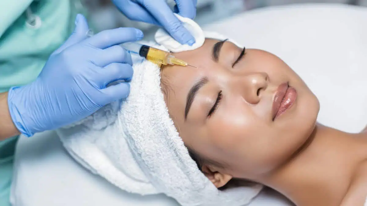 A woman is receiving Sculptra Treatment in Glen Allen, VA at Aesthetic Center of Richmond Dermatology